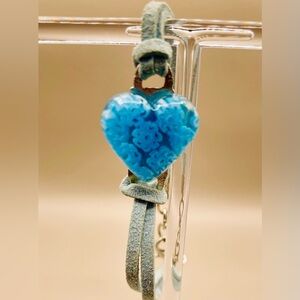 Murano glass heart pendant on a light blue suede cord bracelet. Blue. 7 inches